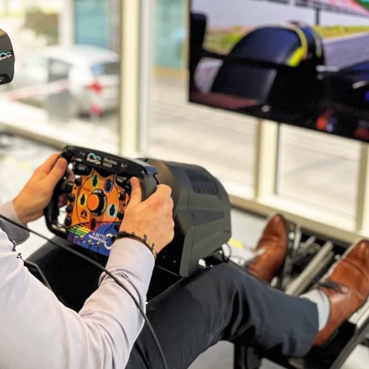 Orange F1 steering wheel.